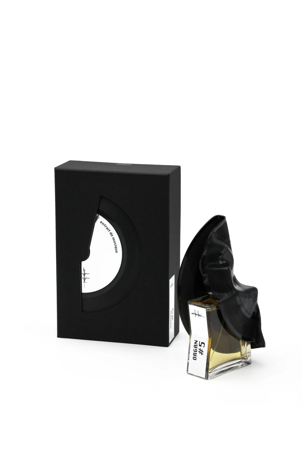 Il flacone di ORGAN #5 Filippo Sorcinelli Extrait de Parfum posizionato accanto alla sua scatola / confezione ufficiale di design. | L'Atelier Dei Profumi