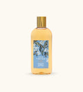 Flacone Di Gel Doccia Fragonard Fleur D Oranger Su Sfondo Con Fiori D Arancio E Agrumi.