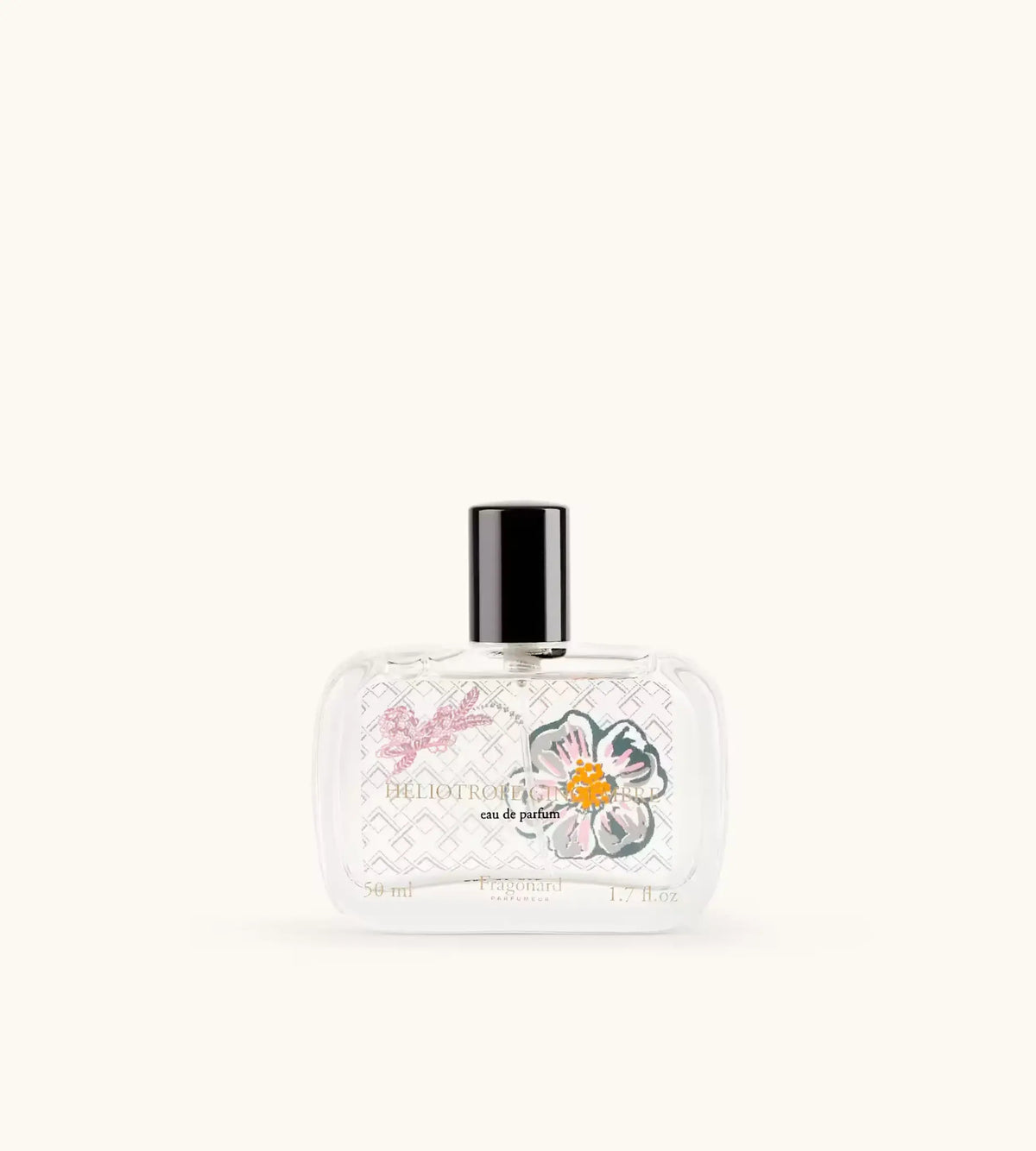 Flacone Di Profumo Fragonard Heliotrope Gingembre Eau De Parfum 50 Ml Su Sfondo Con Dettagli Speziati E Floreali.