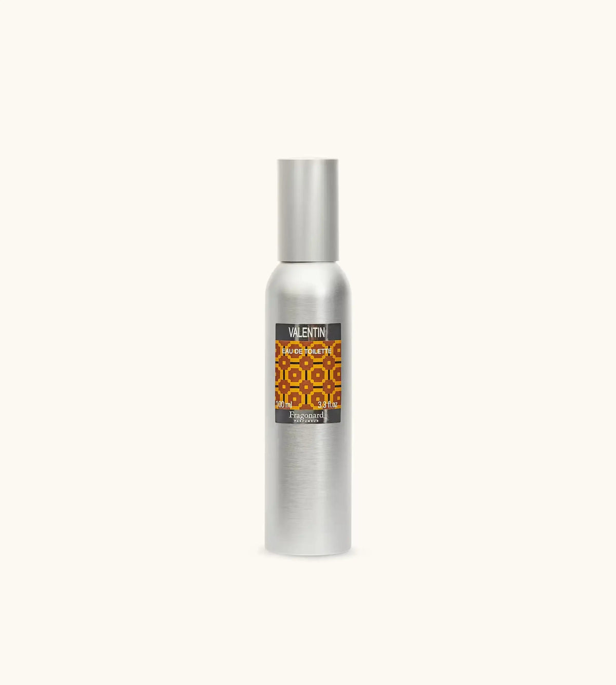 Flacone Di Profumo Fragonard Valentin Eau De Toilette 100 Ml Su Sfondo Con Dettagli Agrumati E Speziati.