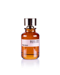 Vista frontale del profumo Tonka Rouge di Maison Tahité, flacone ambrato elegante | L'Atelier dei Profumi