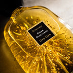 Dettaglio flacone Rose Omeyyade con iconiche foglie d'oro 24k - Alta Profumeria Artistica